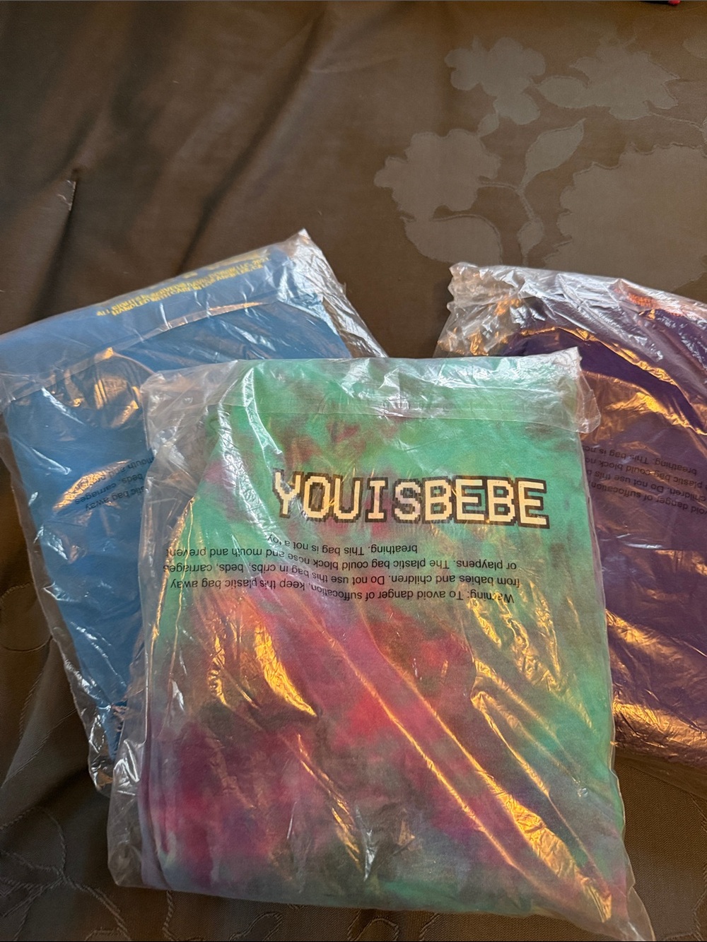 Three pairs of sweatpants, Tie-Dye Tee - Green, Pink, Purple and Blue.